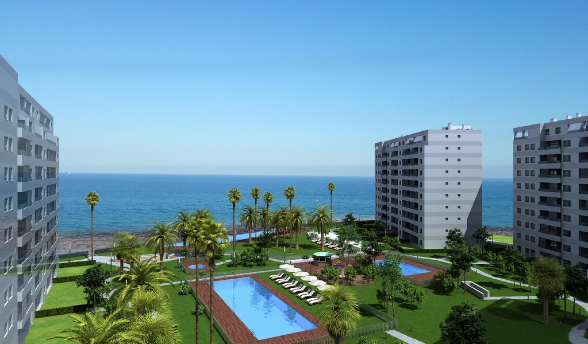 Apartments for sale on the first line of the sea and the beach in Punta Prima in Medvilla Spanje